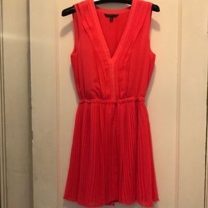 Bright coral pink pleated dress
